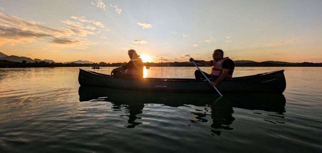 Sonnenuntergangstour mit Kanu Kini auf dem Forggensee